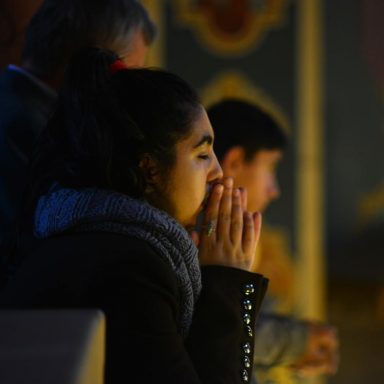 A young woman during an ignatian spirituality prayer