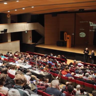 Image of the audience at an event organized by the Jesuit San Fedele Cultural Center in Milan