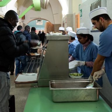 Distribution of meals at the canteen of the Jesuit Refugee Service, Centro Astalli