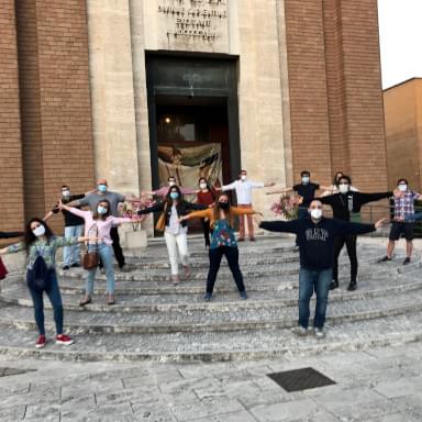 Young people in front of the La Sapienza University Chapel in Rome, Italy
